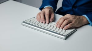 person-typing-on-a-computer-keyboard-businessman-2023-11-27-05-14-50-utc